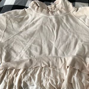 Free People sweatshirt.